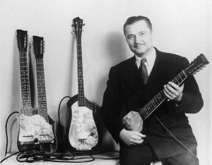 Paul Tutmarc with a No. 736 Bass (center), ca. 1937